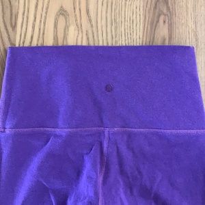 Purple lululemon tights, cloth material - purple. Fits 5/6
